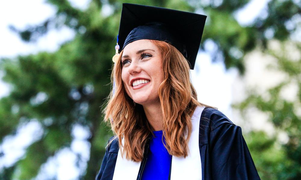 Woman smiling at her graduation