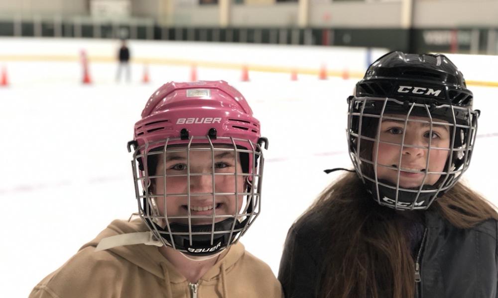 Two girls public skating