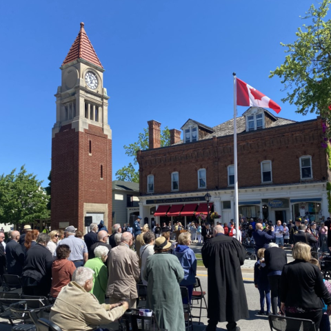 Photograph of celebratory service held in front of the Cenotaph. 