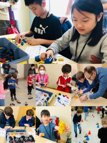 Children building robotic cars